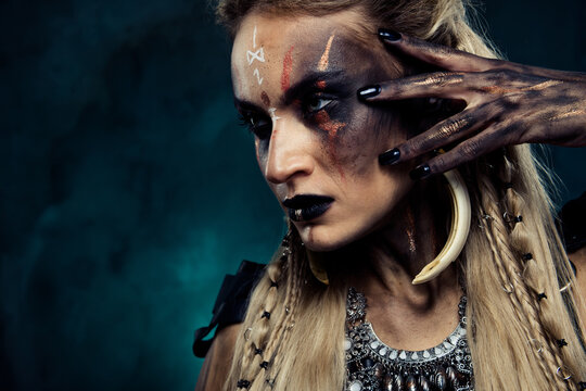 Close up photo of lady prepare theme cosplay halloween festival touch make up dressed in viking character