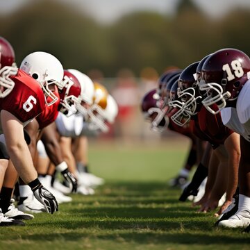 In a football game, the offense and defense position themselves on opposite sides of the line.