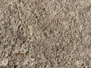 Textures of old concrete. Gray concrete background, wall, aged slab. Top view, close-up.
