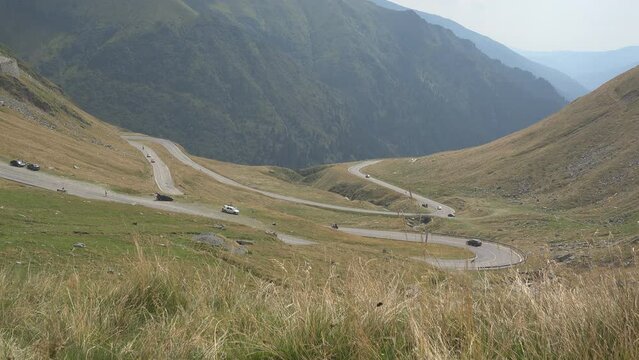 Alpine winding road hairpin turns in the mountains