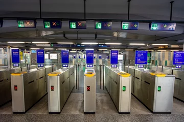 Fotobehang access gates through transport tickets, tickets and passes. Underground platform inside the station belonging to the Lisbon metro © Pedro Emanuel 