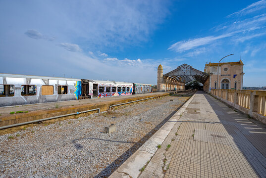 old and deactivated railway station in the city of Barreiro in a state of degradation with obsolete and inoperable train carriages