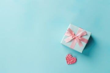 Beautiful composition gift box. Surprise box pastel blue background. Valentine's Day, Easter, Birthday, Happy Women's Day, Mother's Day. Flat lay, top view, copy space