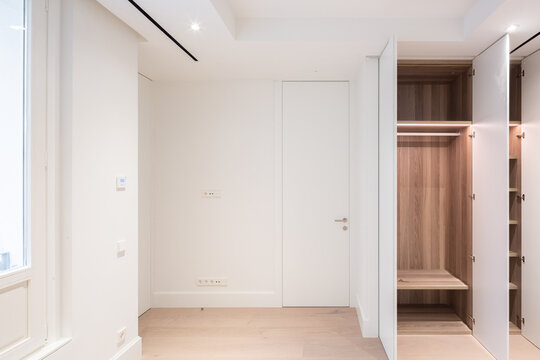 Bedroom with empty wardrobe