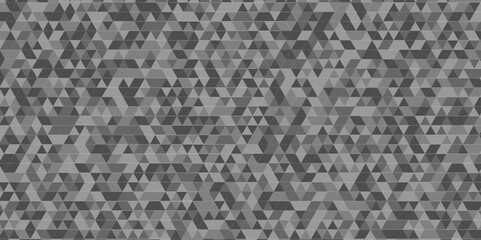 Modern abstract seamless geometric low poly black and gray pattern background. Geometric print composed of triangles. Black and gray wall rough triangle tiles pattern mosaic background.