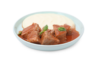 Delicious goulash with mashed potato isolated on white