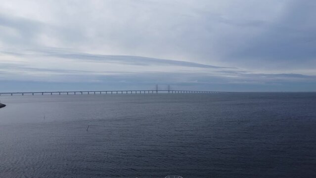Scenic drone footage of Malmo, Sweden. Fascinating aerial views of seaside and Oresund Bridge.