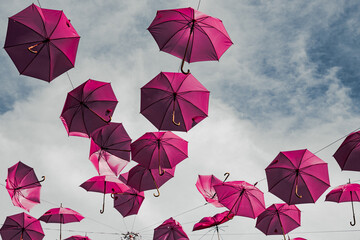 Umbrellas in the sky in the village of La Rochelle in France