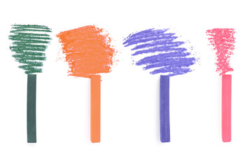 Colorful soft pastels and scribbles on white background, top view. Drawing supply