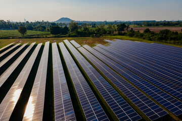 Sun power solar panel field in Thailand in the evening light, Solar panels system power generators from the sun. Energy Transition in Chonburi Thailand in the evening light