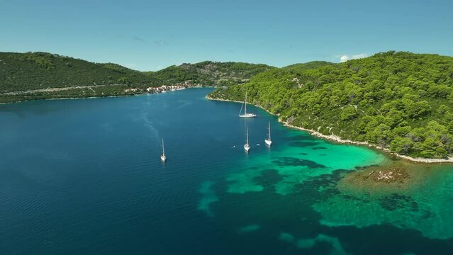 Drone dolley shot over sailing boat on anchor at Mljet Island Croatia.