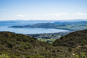 Fototapeta na wymiar Taupo town from Tauhara hill top lookout. Tapuaeharuru bay, Lake Taupo.
