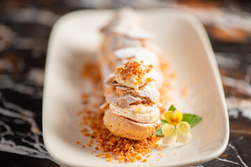 Deliciously crunchy Paris-Brest Eclair filled with almond praline buttercream