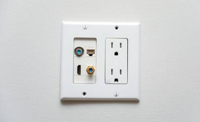 electrical outlet on white wall, concept of power, connectivity, and modern technology in home or office