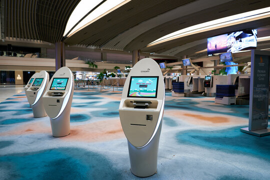 SINGAPORE - NOVEMBER 06, 2023: self check-in kiosks in Singapore Changi Airport Terminal 2.
