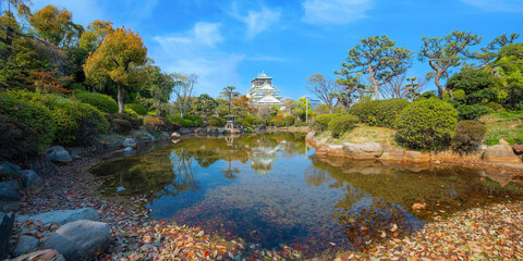 Osaka Castle in Osaka, Japan. It's one of Osaka's most popular hanami spots during the cherry blossom season