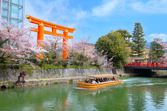Kyoto, Japan - April 2 2023: Okazaki Jikkokubune Boat Ride runs a three kilometers cruise from Nanzenji boat pier to Ebisu Dam and back round trip