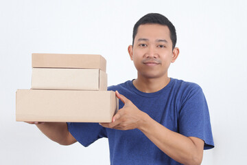 delivery man in blue standing with parcel post box