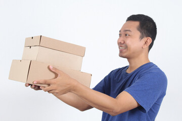 delivery man in blue standing with parcel post box