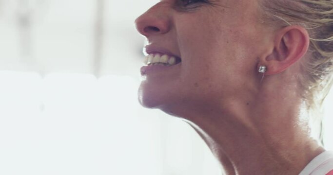 Face, woman and sweating for tough exercise in closeup, gym and fitness for health with satisfaction. Sport person, athlete and active with grit for training, workout and body or muscle build