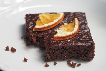 slice of brownie on plate on table 