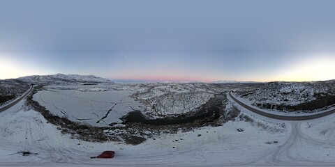Kiruna's icy expanse glows at dusk