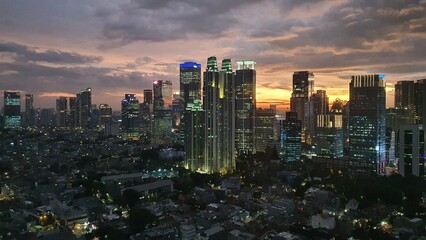 Fototapeta premium Jakarta, Indonesia – March 6, 2023: A sunset view cityscape of Indonesia capital city Jakarta