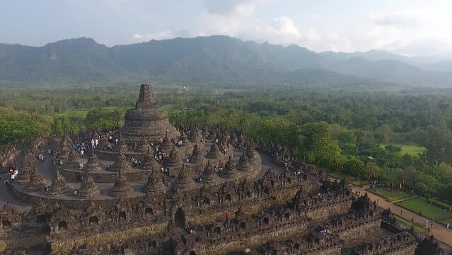 Aerial Footage of Crowded Ancient Historical Seven Wonder Borobudur Candi Temple at Magelang, Central Java, Indonesia