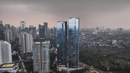 Fototapeta na wymiar Jakarta downtown buildings at sunset. 