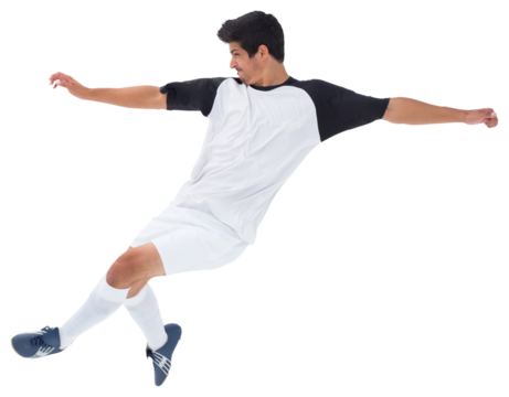 Digital png photo of focused latino football player kicking on transparent background - Powered by Adobe