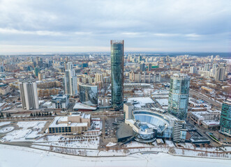 Fototapeta na wymiar Yekaterinburg aerial panoramic view in Winter at sunset. Ekaterinburg is the fourth largest city in Russia located in the Eurasian continent on the border of Europe and Asia.