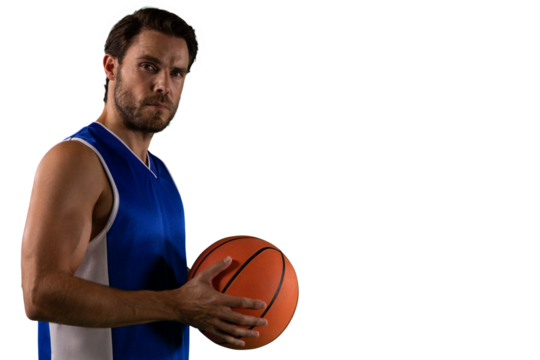Digital png photo of focused biracial male basketball player with ball on transparent background - Powered by Adobe