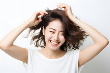 Fototapeta premium Joyful woman feeling free and alive with her hair flying in the wind and hands on her head in excitement. Generative AI