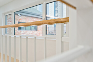 Fototapeta premium If you paint the iron frame of the railing in white, it will create a neater interior without any unnecessary elements