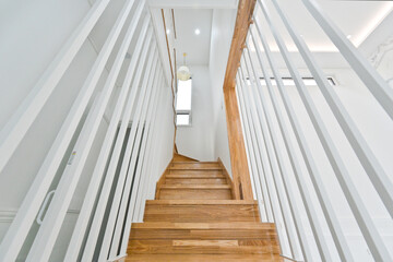 It is a trend these days to have the safety frame in the staircase painted white