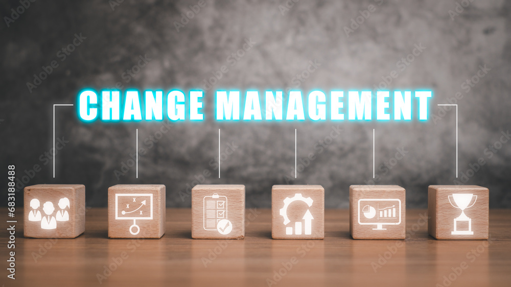 Poster change management concept, wooden block on desk with change management icon on virtual screen.