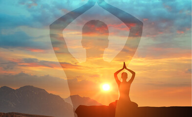 silhouette man practices yoga and meditates on mountain. serenity and yoga practicing at sunset, meditation. spiritual and mental health and peace of mind. Yoga meditation exercises