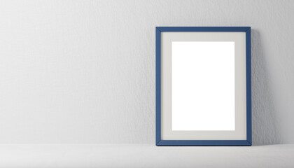photo frame mockup against neutral plaster background. blue photo frame mockup with blank white...