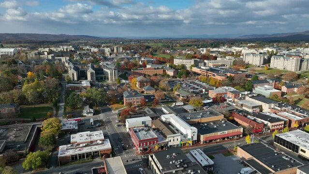 Virginia Tech campus and downtown Blacksburg, VA. Aerial establishing shot in fall.
