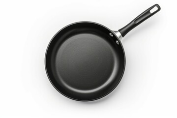 Black frying pan on white backdrop