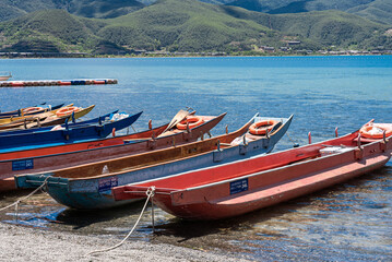 Piggery boats docked on Lugu Lake