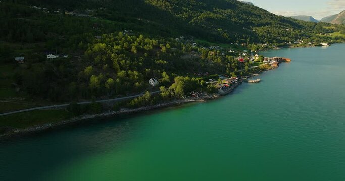 Scenic Village Along Lustrafjorden On The West Coast Of Norway During Summer. Aerial Shot