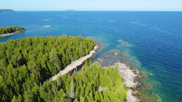 Lush Pine Trees And Blue Seascape At The Scenic Georgian Bay In Ontario, Canada. Aerial Drone Shot