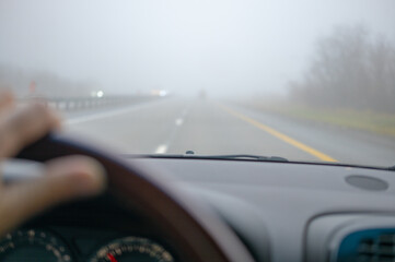 driving in a fog, view from a driver, blurred daylight shot