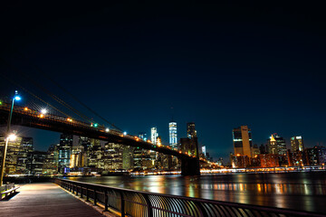 Night View of the Brooklyn Bridge and Manhattan Skyline from Brooklyn Bridge Park - New York City