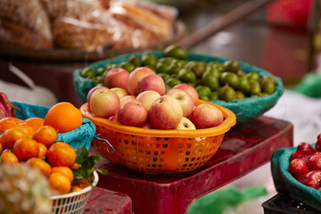 Fresh tropical fruits on display at a traditional market	
