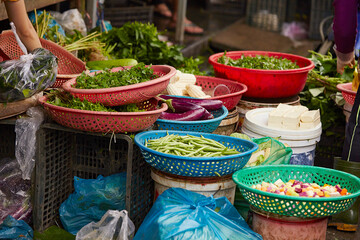 Fresh vegetables on display in a traditional market	