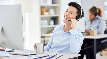 Man, call centre and talking on headset for phone call customer service, computer for telemarketing. Asian person, support and communication employee as agent for internet sales, care at help desk