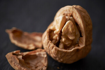 Walnuts on dark background