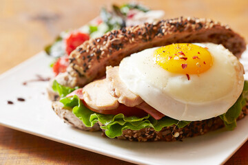 Sandwich with chicken breast and vegetables